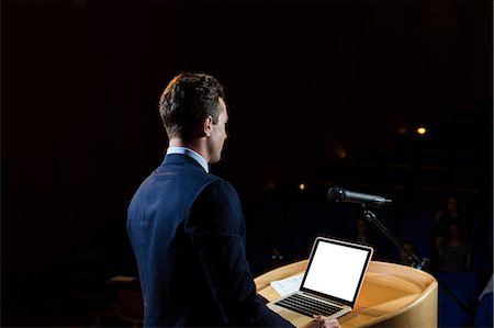 simsearch:6109-08830505,k - Male business executive giving a speech Stock Photo - Premium Royalty-Free, Code: 6109-08830496