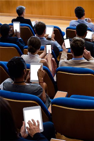 participating - Business executives participating in a business meeting using digital tablet Stock Photo - Premium Royalty-Free, Code: 6109-08830518