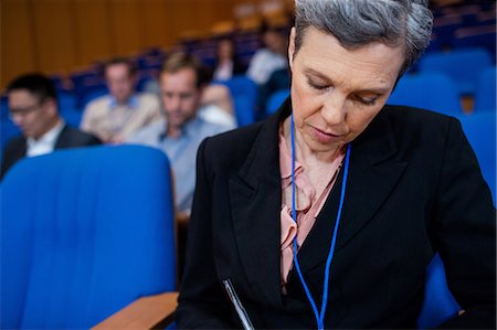 participating - Female business executives participating in a business meeting Stock Photo - Premium Royalty-Free, Code: 6109-08830524