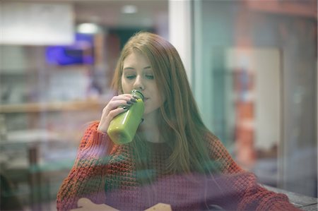 simsearch:649-07119030,k - Woman drinking health drink in the restaurant Stock Photo - Premium Royalty-Free, Code: 6109-08944428