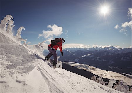 simsearch:6109-06195607,k - Skier skiing in snowy alps during winter Photographie de stock - Premium Libres de Droits, Code: 6109-08944907