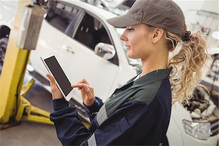 Female mechanic using digital tablet Stockbilder - Premium RF Lizenzfrei, Bildnummer: 6109-08952654