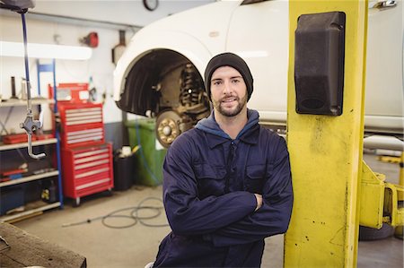 simsearch:6109-08537545,k - Portrait of mechanic standing with arms crossed Stock Photo - Premium Royalty-Free, Code: 6109-08952720