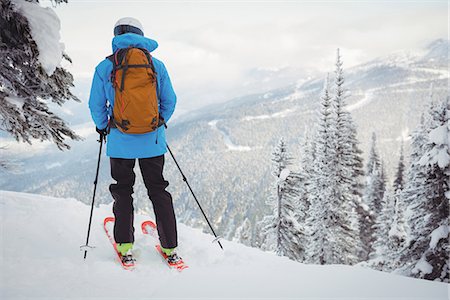 simsearch:6122-07706662,k - Skier skiing on snowy mountains Stock Photo - Premium Royalty-Free, Code: 6109-08952967