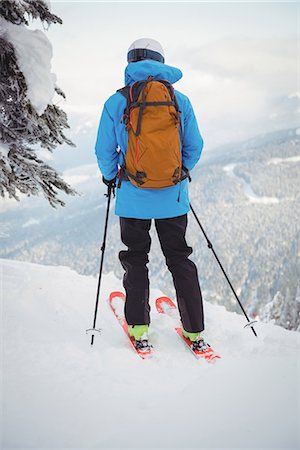 simsearch:6109-08944908,k - Skier skiing on snowy mountains Stock Photo - Premium Royalty-Free, Code: 6109-08952970