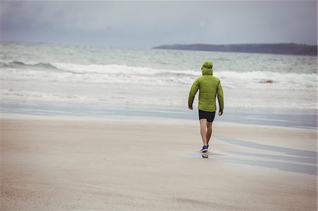 simsearch:649-03511148,k - Rear view of athlete running on the beach Stock Photo - Premium Royalty-Free, Code: 6109-08928446