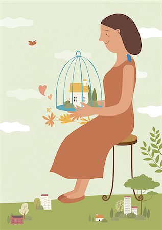 Woman holding house in cage Stock Photo - Premium Royalty-Free, Code: 6111-06838361