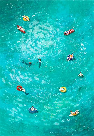 relaxing on innertube - People swimming in sea Photographie de stock - Premium Libres de Droits, Code: 6111-06838463