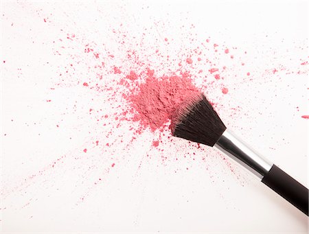 Makeup brush and pink blush powder splatter Stock Photo - Premium Royalty-Free, Code: 6113-06497988