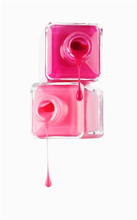 simsearch:6113-06497991,k - Close up of pink fingernail polish dripping from bottles Stock Photo - Premium Royalty-Free, Code: 6113-06498023