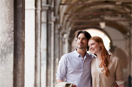 romantic couple venice - Smiling couple in corridor in Venice Stock Photo - Premium Royalty-Free, Code: 6113-06498148