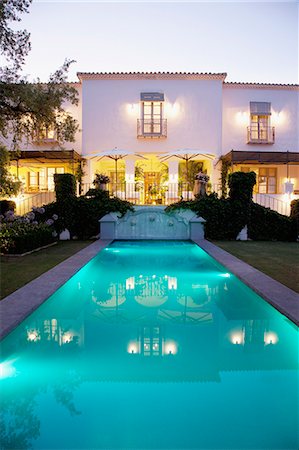 simsearch:6102-08001278,k - Lap pool and Spanish villa Stock Photo - Premium Royalty-Free, Code: 6113-06498367