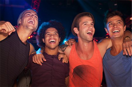 simsearch:649-07648589,k - Enthusiastic men at concert Stock Photo - Premium Royalty-Free, Code: 6113-06498699