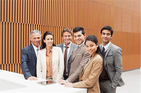 simsearch:6113-06498783,k - Portrait of smiling business people Foto de stock - Royalty Free Premium, Número: 6113-06498798