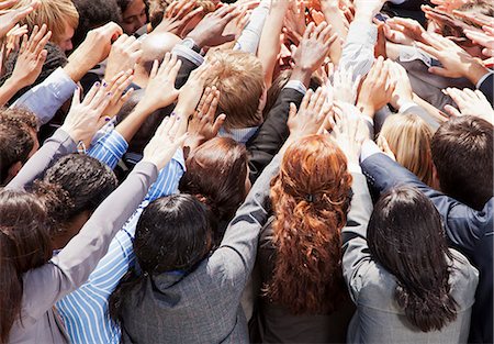 Crowd of business people reaching Stock Photo - Premium Royalty-Free, Code: 6113-06499197