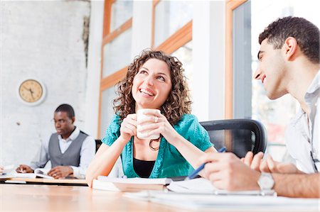 Business people talking in office Stock Photo - Premium Royalty-Free, Code: 6113-06625480