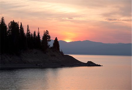 pine - Sun setting over rural mountains Stock Photo - Premium Royalty-Free, Code: 6113-06625554