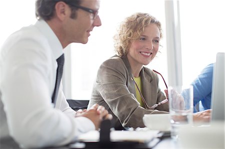 Business people talking in meeting Stock Photo - Premium Royalty-Free, Code: 6113-06625707