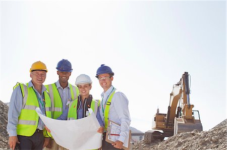 simsearch:6113-06625850,k - Business people reading blueprints in quarry Photographie de stock - Premium Libres de Droits, Code: 6113-06625897