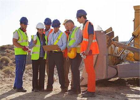 Workers and business people talking on site Stock Photo - Premium Royalty-Free, Code: 6113-06625910