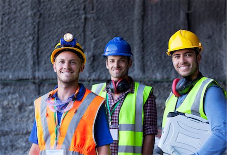 smiling working men building outdoor - Workers smiling on site Stock Photo - Premium Royalty-Free, Code: 6113-06625914