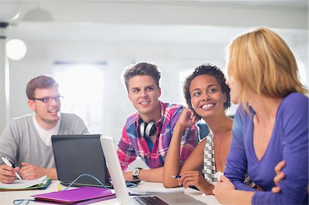 Business people talking in meeting Stock Photo - Premium Royalty-Free, Code: 6113-06626081