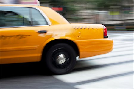 speed travel - Blurred view of taxi on city street Stock Photo - Premium Royalty-Free, Code: 6113-06626126