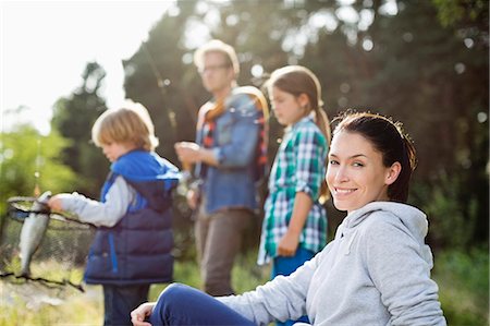 father, son, fishing - Family fishing together in tall grass Stock Photo - Premium Royalty-Free, Code: 6113-06626362