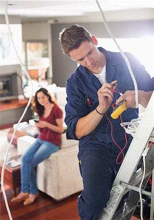 simsearch:6113-06753252,k - Electrician working in home Stock Photo - Premium Royalty-Free, Code: 6113-06753254