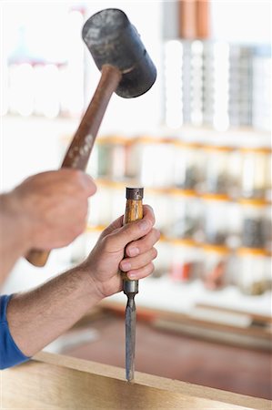 pound - Man working in workshop Foto de stock - Sin royalties Premium, Código: 6113-06753280