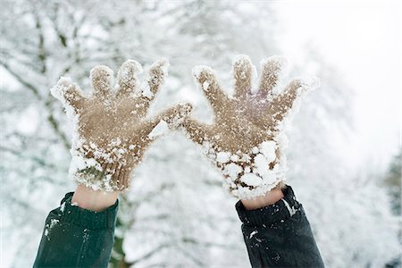 Close up of snowy gloves Fotografie stock - Premium Royalty-Free, Codice: 6113-06753357