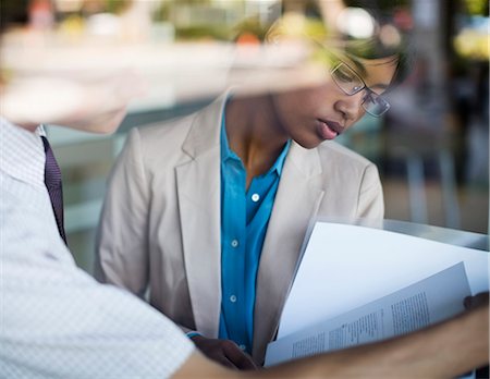 reading - Business people talking in office Stock Photo - Premium Royalty-Free, Code: 6113-06753474