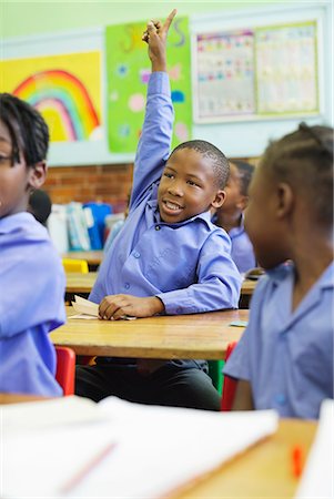 participant - Student raising hand in class Photographie de stock - Premium Libres de Droits, Code: 6113-06753831