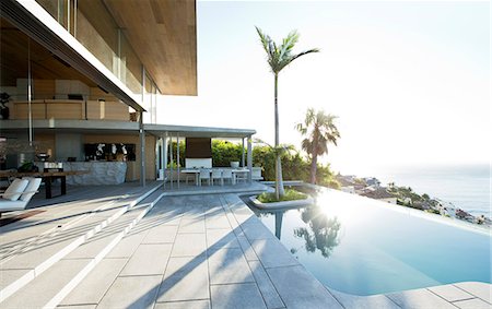 sea swimming pool - Palm tree in infinity pool Stock Photo - Premium Royalty-Free, Code: 6113-06753948