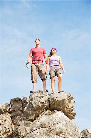 simsearch:6113-06754164,k - Climbers on rocky hilltop Stock Photo - Premium Royalty-Free, Code: 6113-06754091