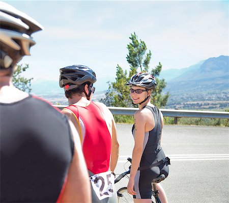 female triathlon - Cyclists talking on rural road Stock Photo - Premium Royalty-Free, Code: 6113-06754027