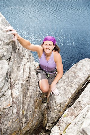 risque - Climber scaling rock face Photographie de stock - Premium Libres de Droits, Code: 6113-06754164