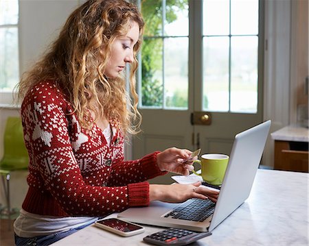 phone payment - Woman shopping on laptop Stock Photo - Premium Royalty-Free, Code: 6113-06754198