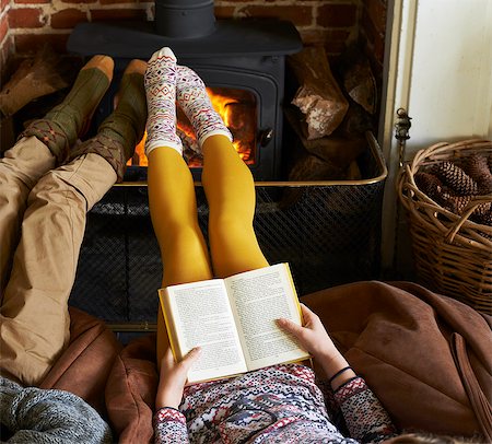 foot - Children relaxing by fire Stock Photo - Premium Royalty-Free, Code: 6113-06720262