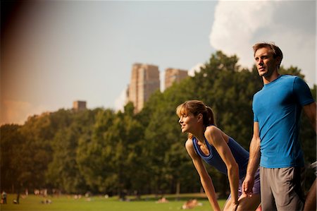 simsearch:6113-06720362,k - Couple resting in urban park Foto de stock - Sin royalties Premium, Código: 6113-06720364