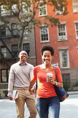 street coffee - Couple walking together on city street Stock Photo - Premium Royalty-Free, Code: 6113-06720455