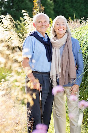 senior citizen outdoor gardens - Older couple standing together outdoors Stock Photo - Premium Royalty-Free, Code: 6113-06720663