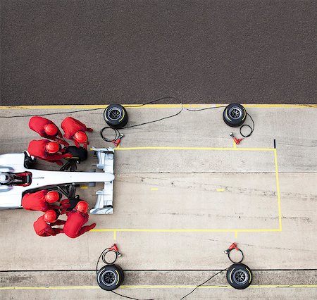 Racing team working at pit stop Photographie de stock - Premium Libres de Droits, Code: 6113-06720753