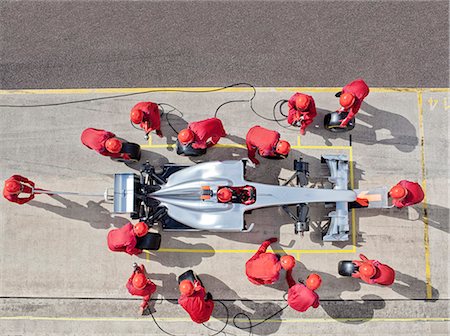 Racing team working at pit stop Foto de stock - Sin royalties Premium, Código: 6113-06720847