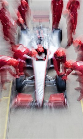 support (physical human) - Racing team working at pit stop Stock Photo - Premium Royalty-Free, Code: 6113-06720846