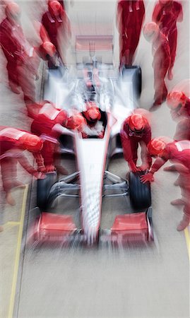 racing car driver - Racing team working at pit stop Stock Photo - Premium Royalty-Free, Code: 6113-06720846