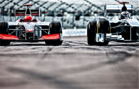 formula one - Race cars driving on track Stock Photo - Premium Royalty-Free, Code: 6113-06720831