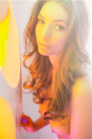 desnudo - Nude woman standing by light Foto de stock - Sin royalties Premium, Código: 6113-06721074