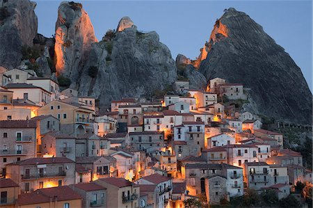 dusk - Village on hillside in rural landscape Stock Photo - Premium Royalty-Free, Code: 6113-06721122