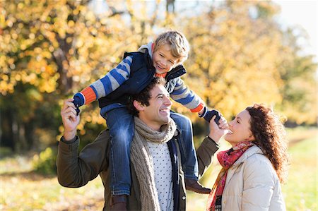 simsearch:6113-06721280,k - Caucasian family walking in park Stock Photo - Premium Royalty-Free, Code: 6113-06721280